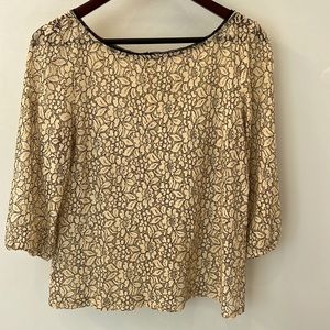 Loft lace blouse with cute button detail on back. Perfect with skirt or jeans.